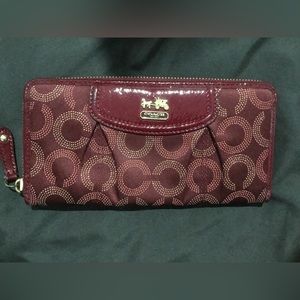 Maroon cloth accordion zippered Coach wallet
